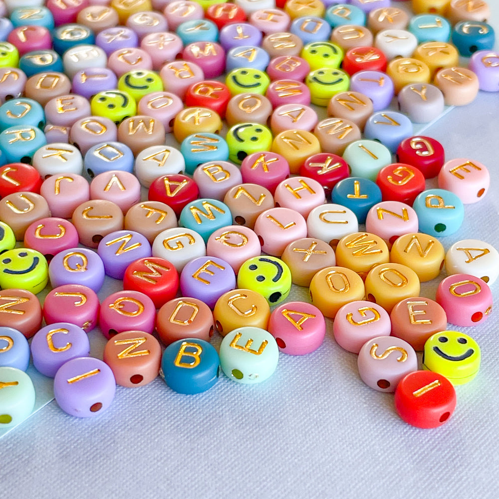 7mm Muted Rainbow Gold Letter Acrylic Coin Bead Pack – Beads, Inc.
